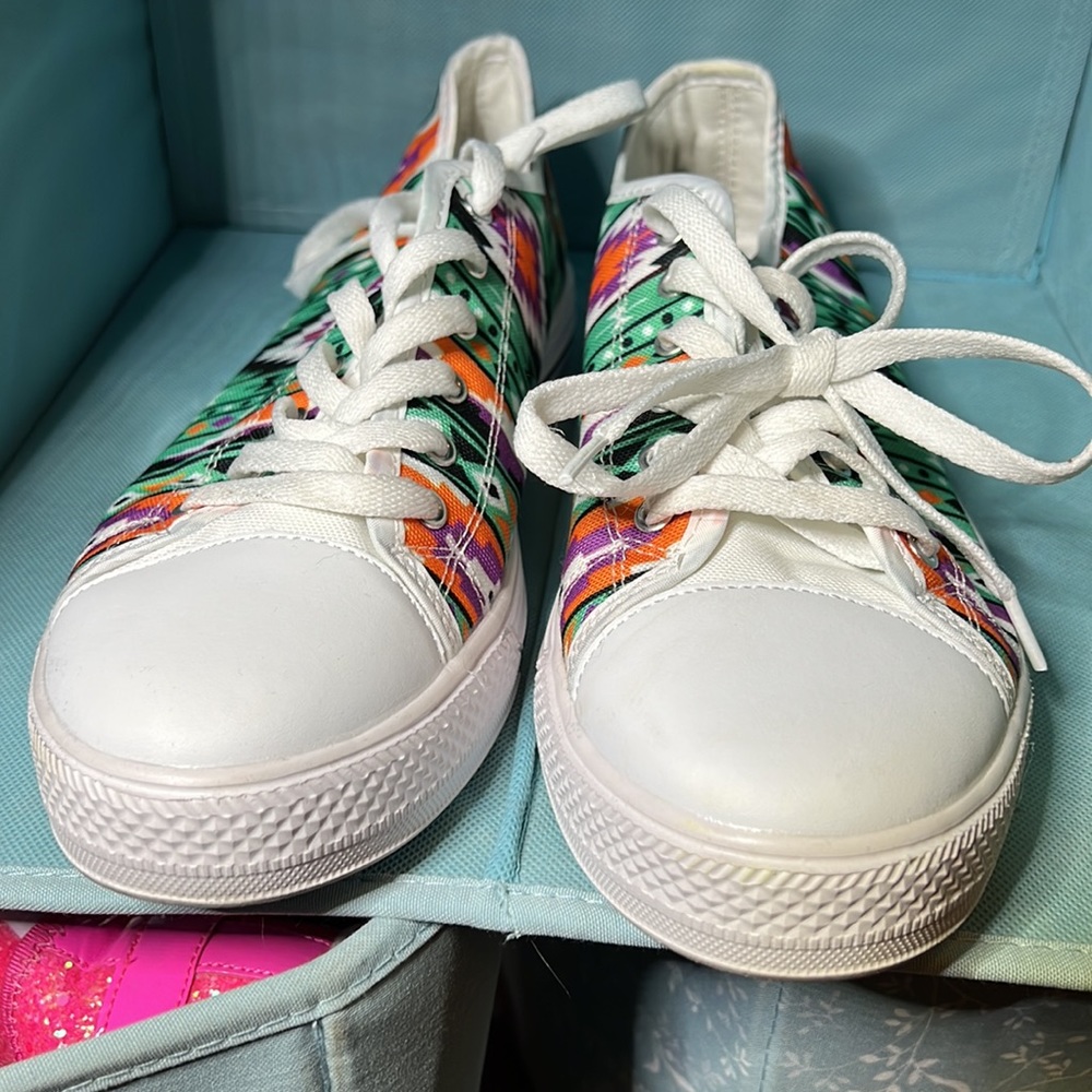 Aztec print canvas and rubber sneakers.